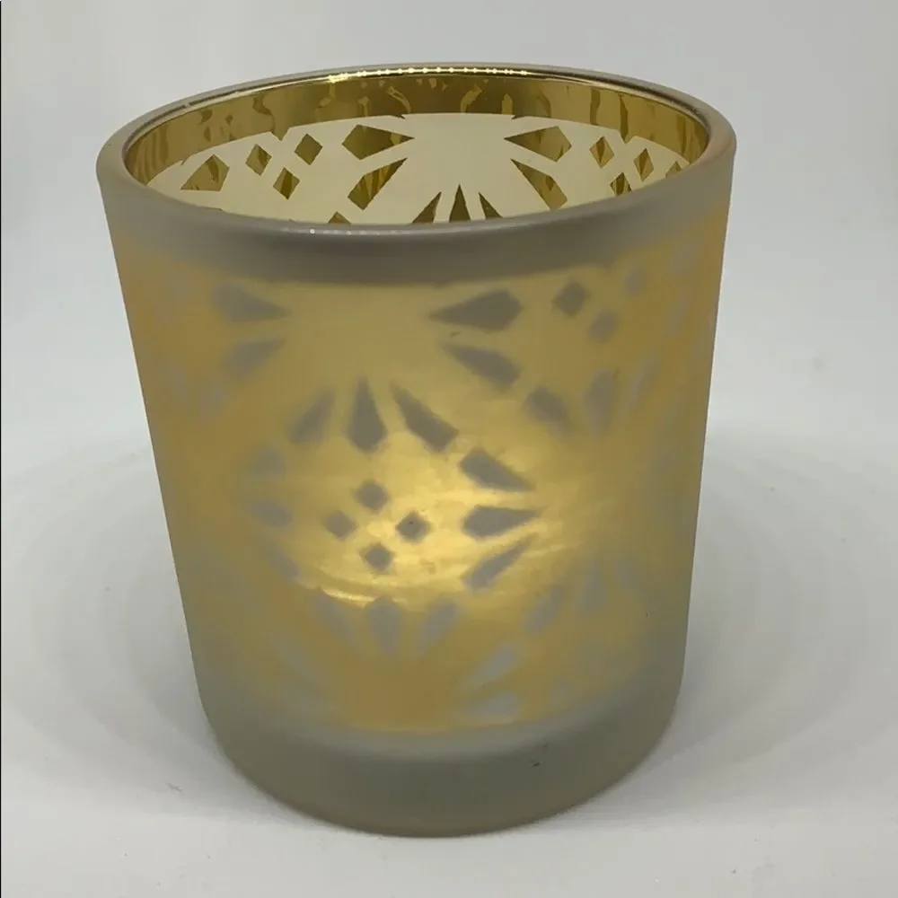 Gold candle holder